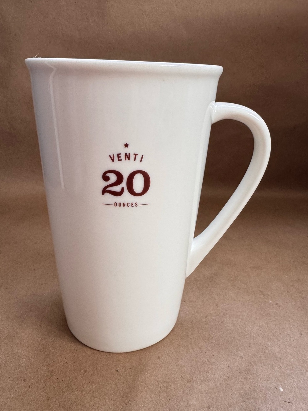 Starbucks 2010 Venti 20 fl oz Mug.